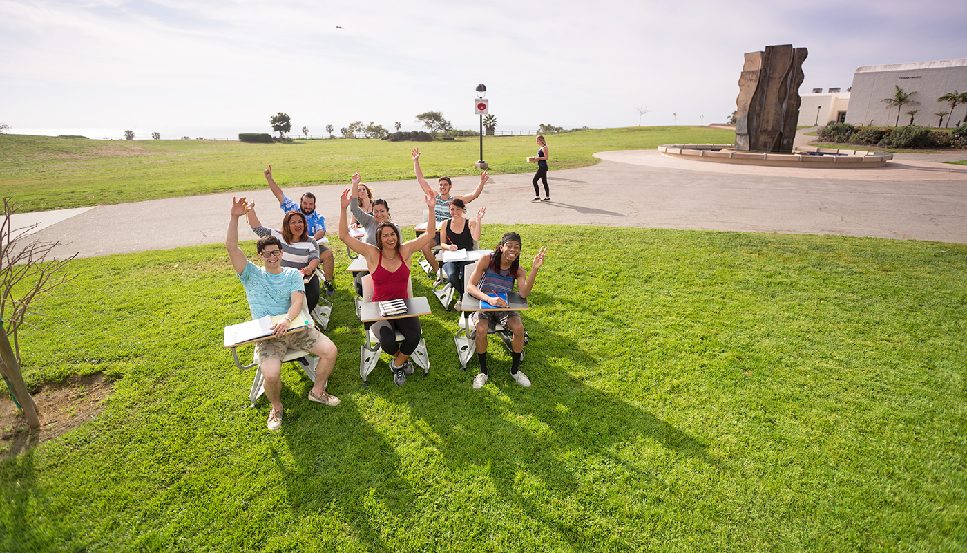 Students on SBCC's west campus lawn.